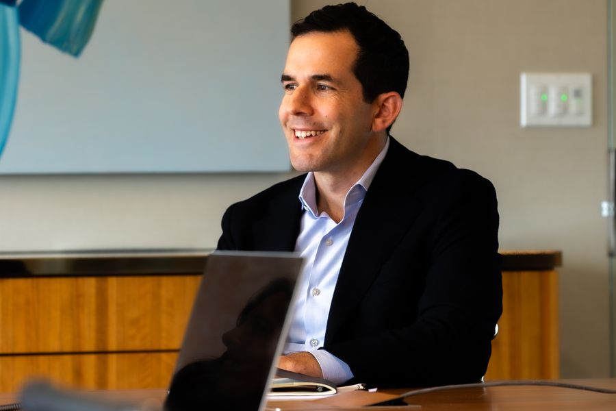 An Astira partner at work in the Boston office