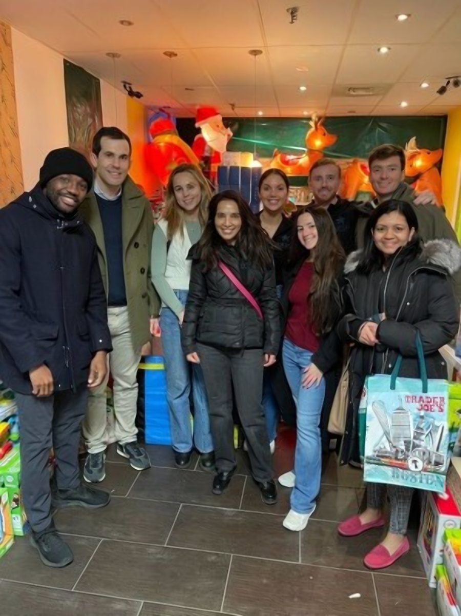 Astira team members sorting gifts at Christmas in the City